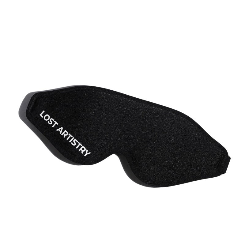 Black sleep mask with 'Lost Artistry' branding on a white background
