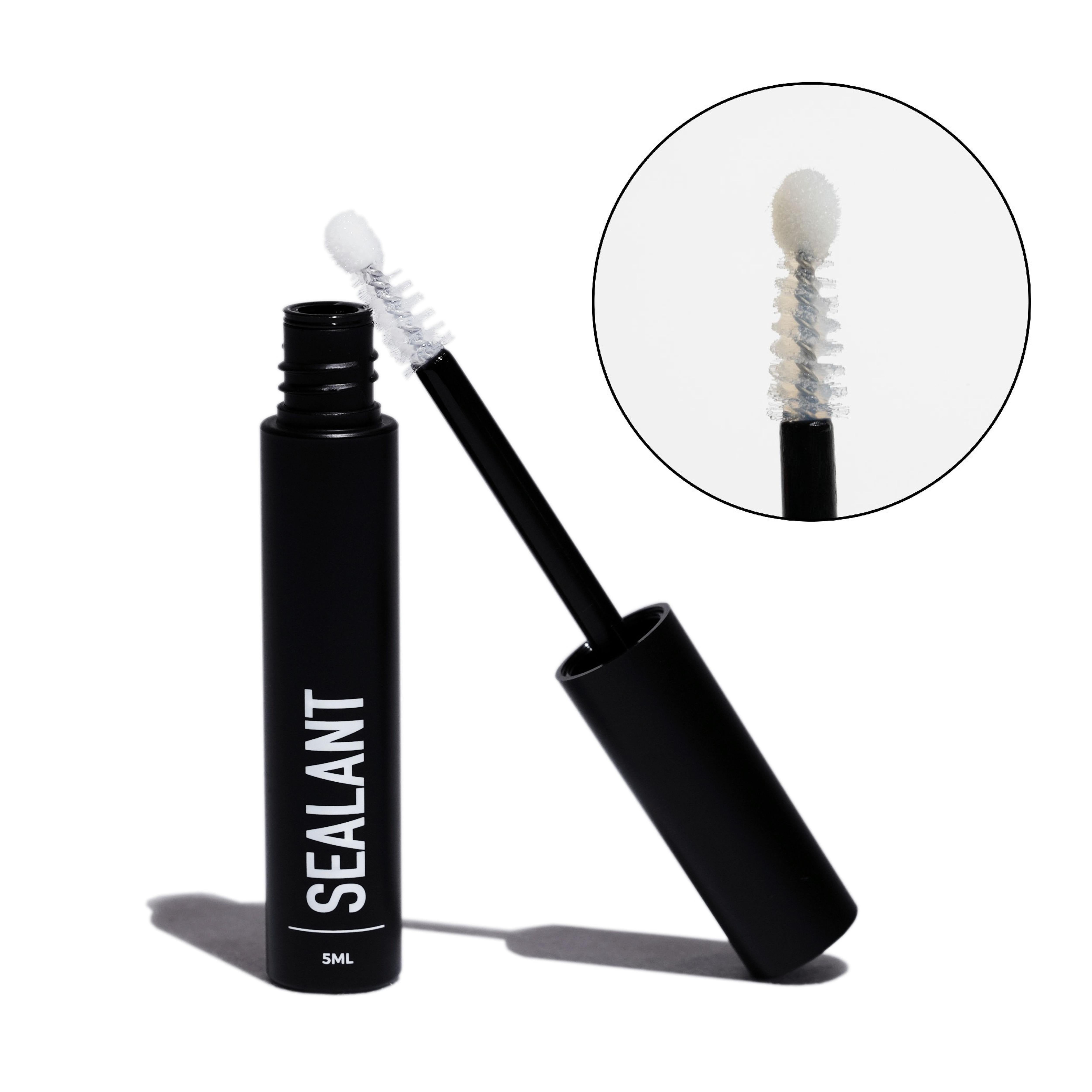 A tube of Citizen Sealant with an applicator, designed for use with false eyelashes to keep them in place and enhance comfort.